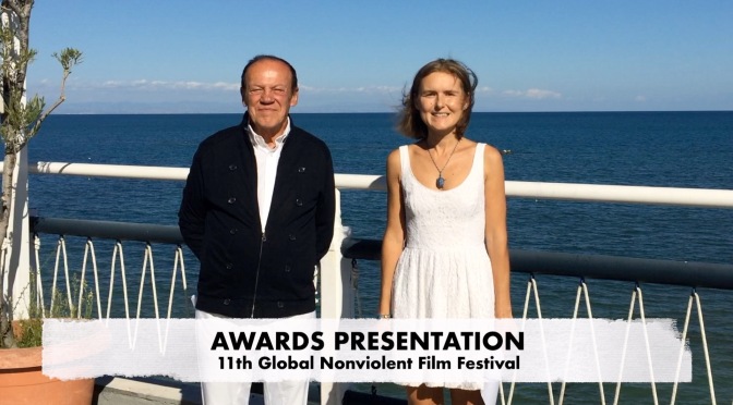 Film director Bruno Pischiutta and producer Daria Trifu present the Awards given by the Jury at the 11th Global Nonviolent Film Festival