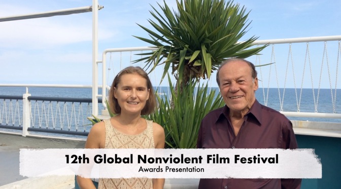 Film producer Daria Trifu and director Bruno Pischiutta present the awards given by the Jury at the 12th Global Nonviolent Film Festival
